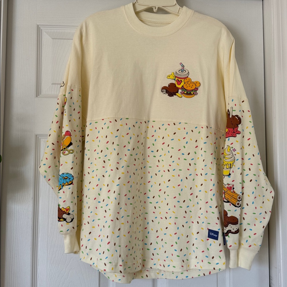 DISNEY EATS SNACKS SPIRIT JERSEY PULLOVER CREAM - XS